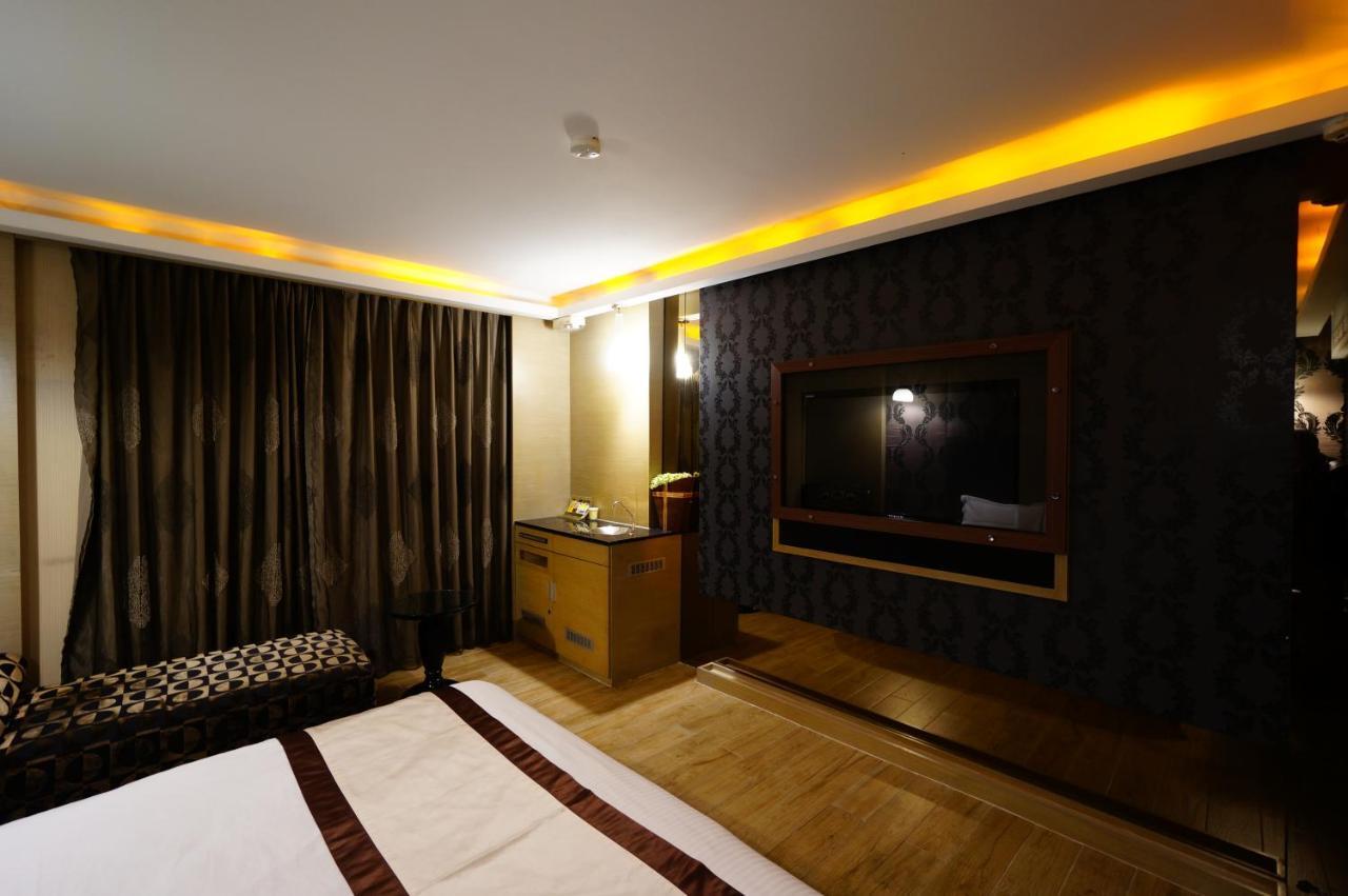 荷村 Motel Wuqi Номер фото
